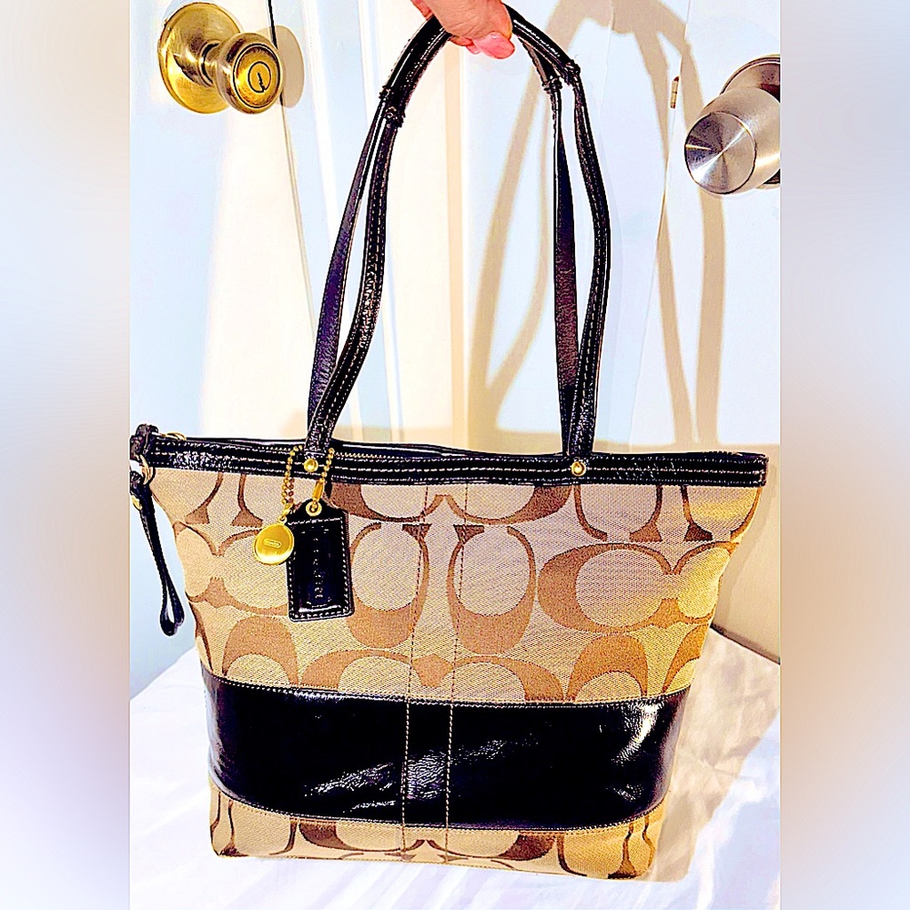 Coach dark brown prairie satchel cute, casual and business style bag.